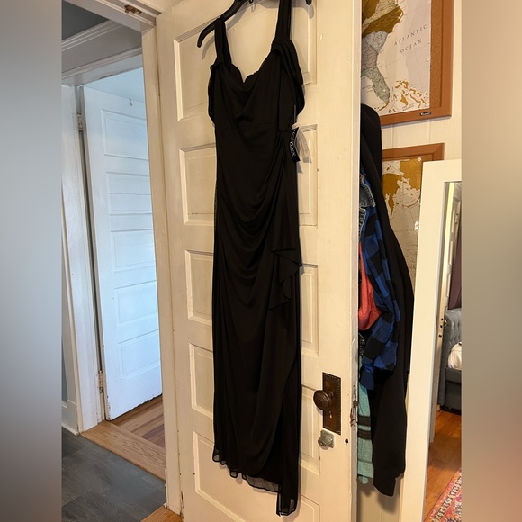 NWT black formal dress w/ some sheer swing side overlay on chest. Zip closure - Picture 2 of 7